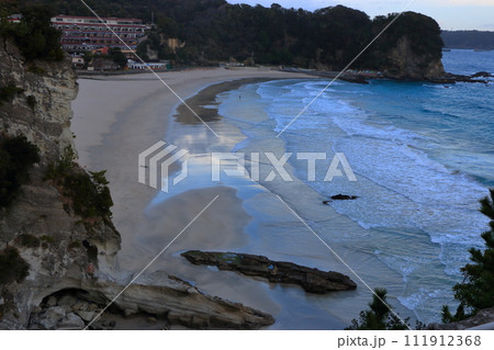 Tatadohama beach at Shimoda on the Izu penninsula of Shizuoka Japan, famous for beautiful white sand, surfing, and nearby onsen hot spring mineral baths 111912368