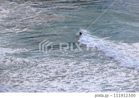 Tatadohama beach at Shimoda on the Izu penninsula of Shizuoka Japan, famous for beautiful white sand, surfing, and nearby onsen hot spring mineral baths 111912380