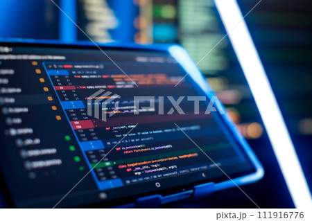 Running Computer data programming. Coding script text on screen. Notebook closeup photo. Running Computer data programming. Coding script text on screen. Notebook closeup photo. 111916776