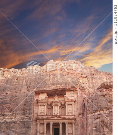 Al Khazneh or The Treasury (against the background of a beautiful sky with clouds). Petra, Jordan-- it is a symbol of Jordan, as well as Jordan's most-visited tourist attraction 111924763