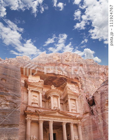 Al Khazneh or The Treasury (against the background of a beautiful sky with clouds). Petra, Jordan-- it is a symbol of Jordan, as well as Jordan's most-visited tourist attraction 111924767