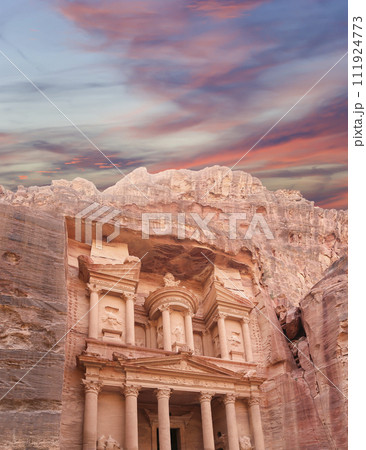 Al Khazneh or The Treasury (against the background of a beautiful sky with clouds). Petra, Jordan-- it is a symbol of Jordan, as well as Jordan's most-visited tourist attraction 111924773