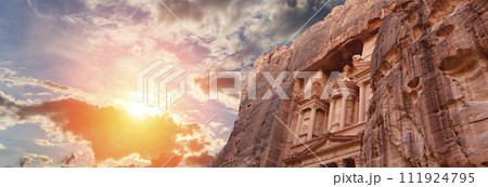 Al Khazneh or The Treasury (against the background of a beautiful sky with clouds). Petra, Jordan-- it is a symbol of Jordan, as well as Jordan's most-visited tourist attraction 111924795