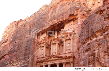 Al Khazneh or The Treasury (carved on white background). Petra, Jordan-- it is a symbol of Jordan, as well as Jordan's most-visited tourist attraction Al Khazneh or The Treasury (carved on white background). Petra, Jordan-- it is a symbol of Jordan, as well as Jordan's most-visited tourist attraction 111924799