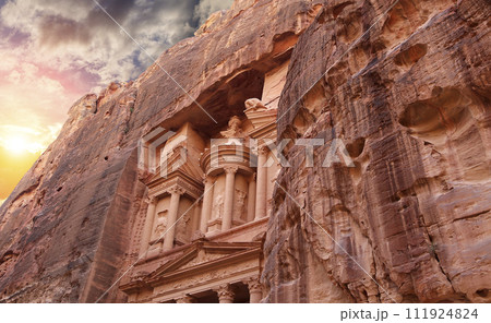 Al Khazneh or The Treasury (against the background of a beautiful sky with clouds). Petra, Jordan-- it is a symbol of Jordan, as well as Jordan's most-visited tourist attraction 111924824