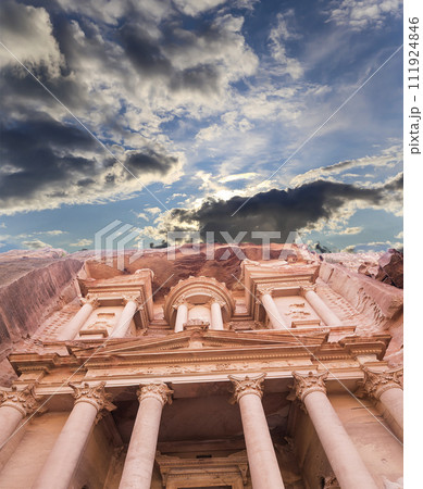 Al Khazneh or The Treasury (against the background of a beautiful sky with clouds). Petra, Jordan-- it is a symbol of Jordan, as well as Jordan's most-visited tourist attraction 111924846