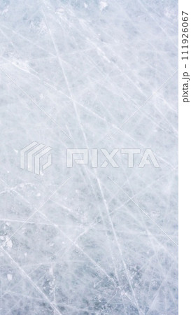 Ice background with marks from skating and hockey, blue texture of rink surface with scratches 111926067