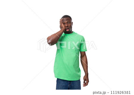 american brunette man with short hair dressed in a light green t-shirt feels excited 111926381