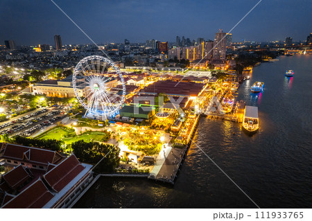 Aerial view of Asiatique The Riverfront open night market at the Chao Phraya river in Bangkok Aerial view of Asiatique The Riverfront open night market at the Chao Phraya river in Bangkok 111933765