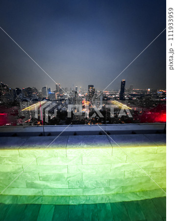 Rooftop pool with Bangkok skyline view at sunset, in Bangkok Thailand 111933959