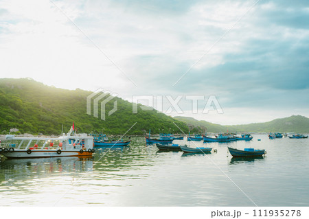 boats floating on the lake 111935278