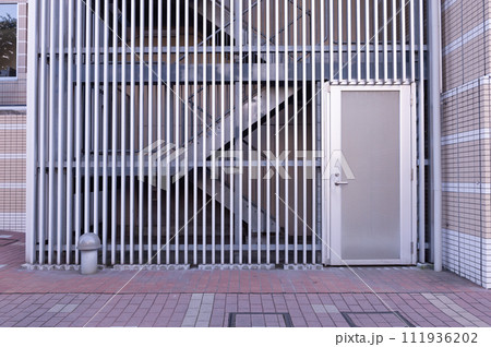 street wall background ,Industrial background, empty grunge urban street with warehouse brick wall street wall background ,Industrial background, empty grunge urban street with warehouse brick wall 111936202