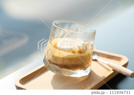Affogato Coffee made by Vanilla ice cream and on top with Espresso Shot 111936731