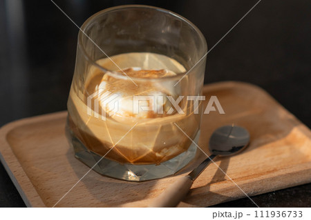 Affogato Coffee made by Vanilla ice cream and on top with Espresso Shot 111936733