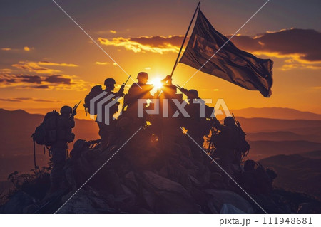 Heroic silhouettes raise the flag at sunset a symbol of the will to win 111948681
