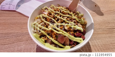 Japanese fusion rice bowl with toppings 111954955