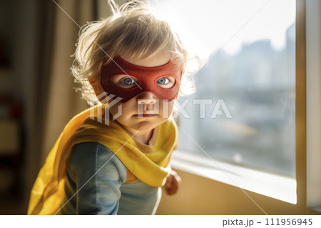 AI-generated content. Child in superhero costume with eye mask and cape. AI-generated content. Child in superhero costume with eye mask and cape. 111956945