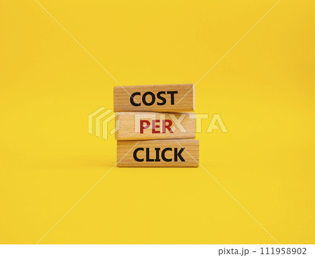 Cost Per Click symbol. Concept word Cost Per Click on wooden cubes. Beautiful yellow background. Business and Cost Per Click concept. Copy space. Cost Per Click symbol. Concept word Cost Per Click on wooden cubes. Beautiful yellow background. Business and Cost Per Click concept. Copy space. 111958902