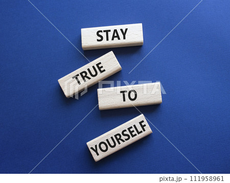 Stay True to Yourself symbol. Wooden blocks with words Stay True to Yourself. Beautiful deep blue background. Business and Stay True to Yourself concept. Copy space. 111958961
