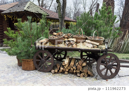 an old village cart with firewood in the market 111962273