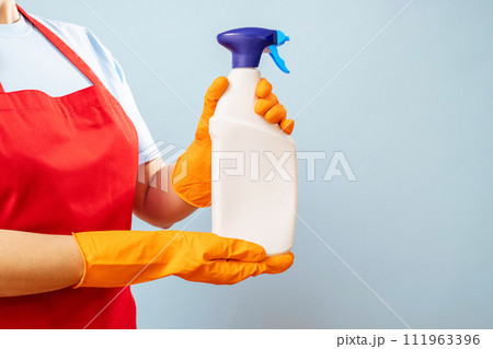 Professional Cleaner Holding Spray Bottle Professional Cleaner Holding Spray Bottle 111963396