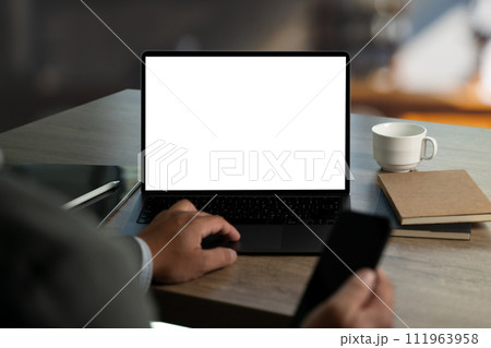 man working on his laptop with blank copy space screen mockup, template for your text man working on his laptop with blank copy space screen mockup, template for your text 111963958