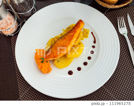 Salmon with potato and sweet potato puree Salmon with potato and sweet potato puree 111965278
