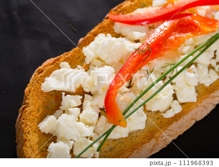 Toast with soft cheese and bell pepper Toast with soft cheese and bell pepper 111968393