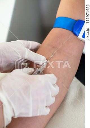 blood from the vein. shot in the arm close-up 111971486