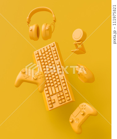 Modern home office setup featuring keyboard, gaming controllers and headphones Modern home office setup featuring keyboard, gaming controllers and headphones 111975821