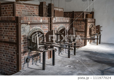 Dachau, Germany - Oven in the crematorium at the Dachau concentration camp for burning dead Dachau, Germany - Oven in the crematorium at the Dachau concentration camp for burning dead 111977024