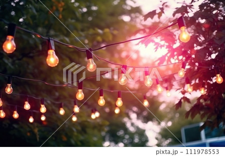 blur of red lights at dusk in garden string fest blur of red lights at dusk in garden string fest 111978553