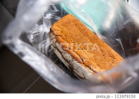 rye bread, sourdough, in a bag, straight from the bakery rye bread, sourdough, in a bag, straight from the bakery 111979150