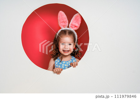 child wearing bunny ears on Easter day child wearing bunny ears on Easter day 111979846