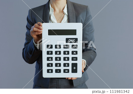 Closeup on woman worker against gray background 111981342
