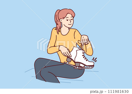 Woman holds pair of skates for trips on ice at figure skating competitions and hockey games Woman holds pair of skates for trips on ice at figure skating competitions and hockey games 111981630