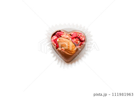 top view of chocolate pralines in heart form isolated on white background top view of chocolate pralines in heart form isolated on white background 111981963