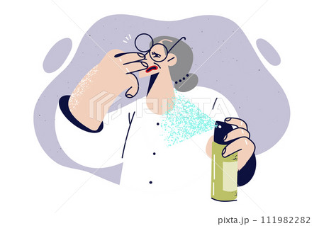 Elderly woman uses air freshener to get rid of harmful smell in apartment, and covers nose Elderly woman uses air freshener to get rid of harmful smell in apartment, and covers nose 111982282