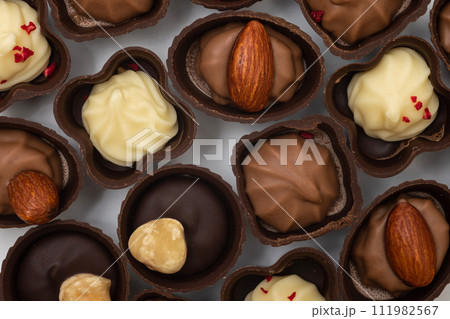 Collection of chocolates. Assortment of sweets, white, dark and milk chocolate. View from above 111982567