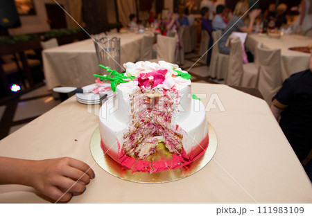 Beautiful cut cake on a restaurant background. 111983109