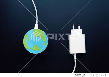Eco energy saving and Earth hour concept. Earth planet with electric plug continuous line on dark background. Switch off light for 1 hour, save the Earth. Eco energy saving and Earth hour concept. Earth planet with electric plug continuous line on dark background. Switch off light for 1 hour, save the Earth. 111985773