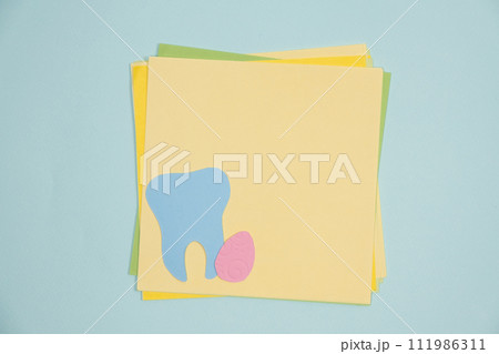 Happy Easter Dental Clinic Greeting Card, Text Space, Teeth and Egg Top View 111986311