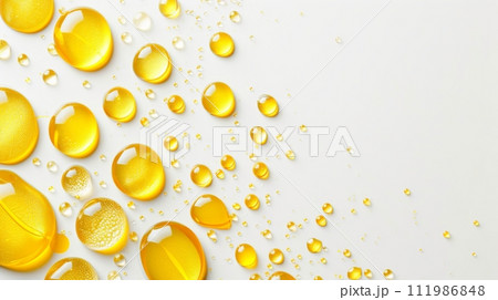 Abstract yellow Liquid Droplets on White Surface 111986848