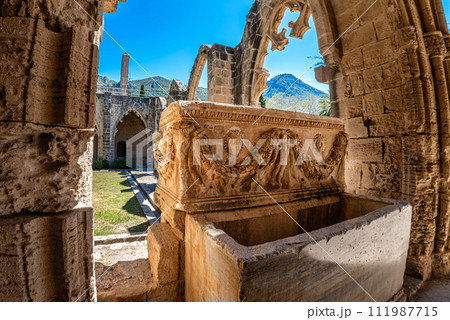 Stone carved sarcophagus in Bellapais Abbey, Cyprus. 111987715