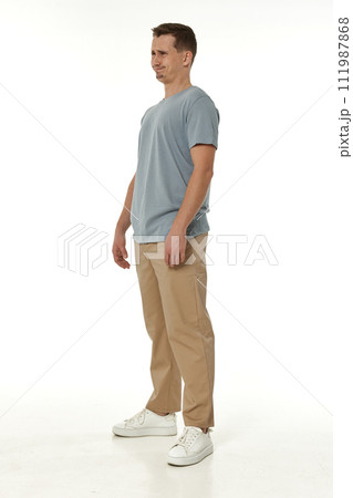 offended frustrated young man on white background. sadness 111987868