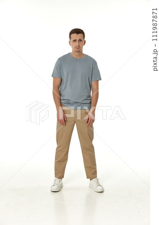 offended frustrated young man on white background. sadness offended frustrated young man on white background. sadness 111987871