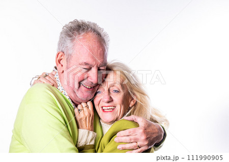 Joyful Elderly Couple Embracing Lovingly 111990905
