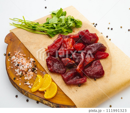 Peeled sun-creamfish with delicious caviar lies on a white plate 111991323
