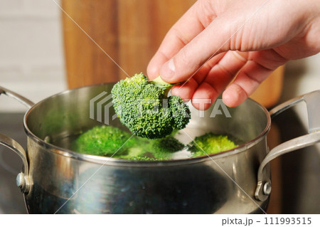 Cooking broccoli, proper, healthy nutrition. Selective focus 111993515