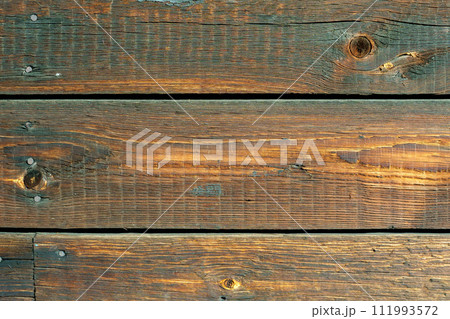 Wood texture, close-up wooden board, striped wood, old table Wood texture, close-up wooden board, striped wood, old table 111993572